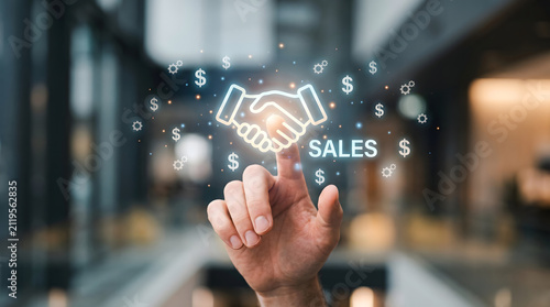 Modern digital sales and business partnership concept with holographic handshake symbol and financial technology
