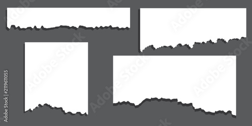 Torn paper silhouettes with jagged edges on a dark background