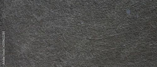 Panel kuchenny z motywem Dark charcoal concrete texture background, rough gray cement wall surface, industrial stone plaster backdrop for architectural design and web overlays