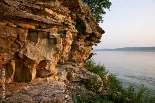 Limestone and sandstone cliffs at Lake Lewisville, showcasing Woodbine Group strata