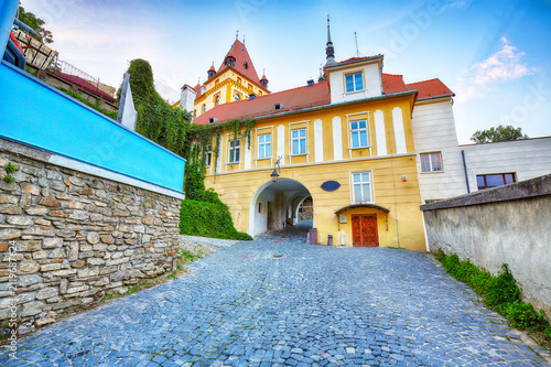 Bild auf Leinwand Remarkable evening view of historic town Sighisoara and Clock Tower built by Saxons