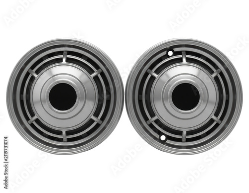 Pair of generic chrome vintage wheel covers isolated over transparent background
