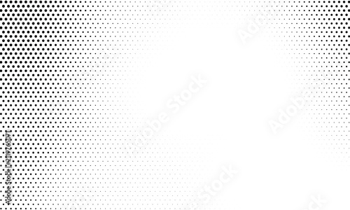 фотографія Black and white halftone dot pattern background texture with fading effect