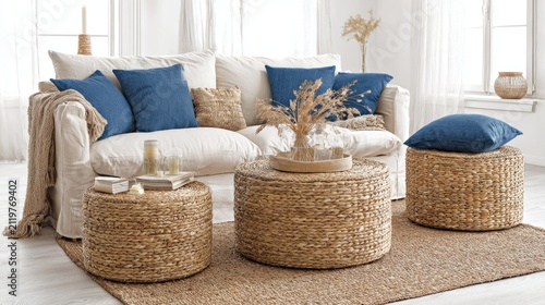 Living room interior with sofa pillows and woven coffee tables