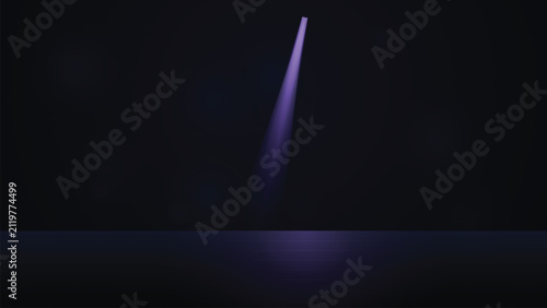 Single purple spotlight beam on dark stage floor with spotlight, background