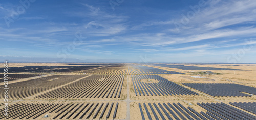 Aerial Panorama of Massive Desert Solar Photovoltaic Power Station for Sand Control