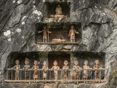 Carved Tau-Tau Statues in Cliff Niches