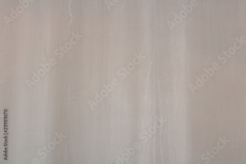 Картината върху платно Smooth light beige concrete wall surface texture background.