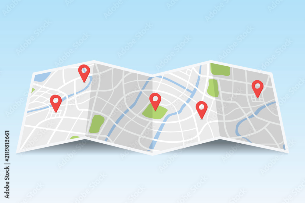 Obraz premium Folded paper city map with multiple red location pin markers, travel, navigation, and destination planning concept.