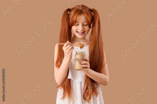 Teenage redhead girl with j...