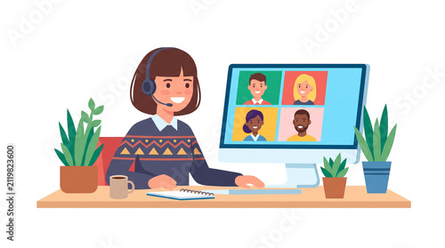 Woman participating in a video conference call with colleagues.