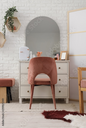 Dressing table with cosmeti...