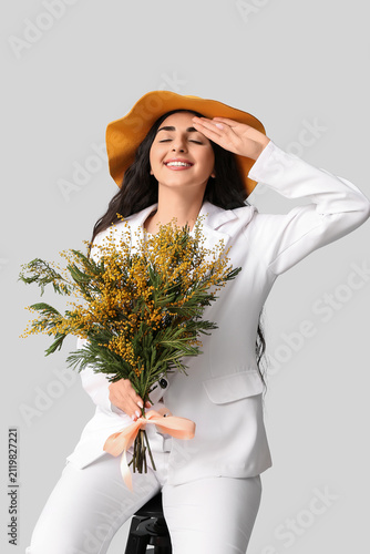 Beautiful young woman with ...
