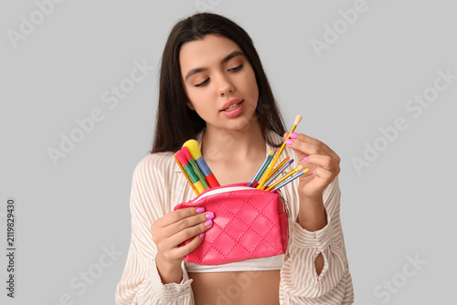 Beautiful young woman with ...