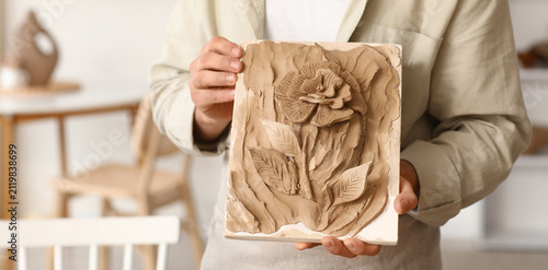 Person holding a handmade c...