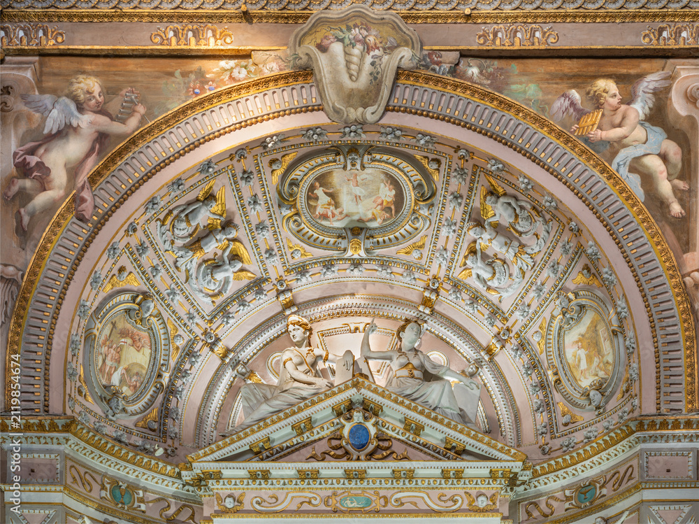 Fototapeta premium CREMA, ITALY - MARCH 20, 2026: The stucco of side altar in the church Santuario di Santa Maria della Croce by Giovan Battista Castello from year (1585)