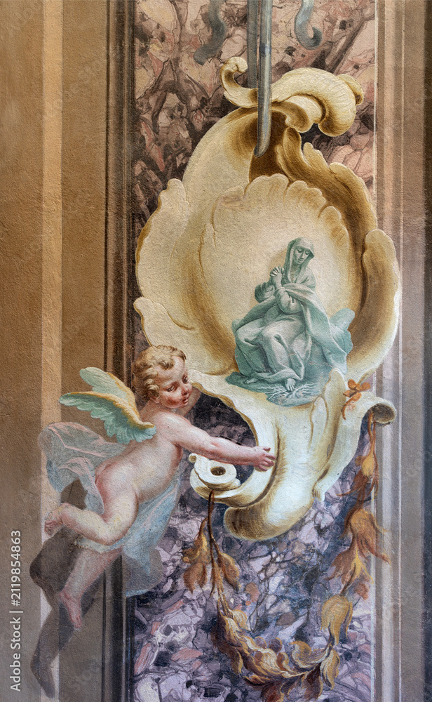 Fototapeta premium CREMA, ITALY - MARCH 20, 2026: The fresco of baroque angel with the saint the church Santuario di Santa Maria della Croce by brothers Giuseppe and Giovanni Antonio Torricell from year 1762