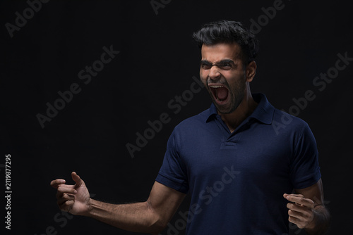 violent young man screaming