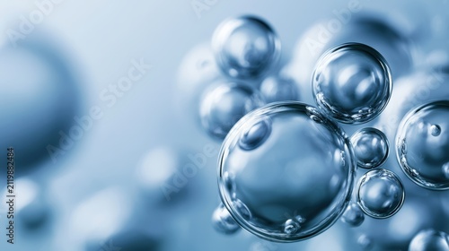 Close-up of translucent round bubbles floating in soft blue background with reflective surface and delicate shadows creating a calming and abstract effect in liquid