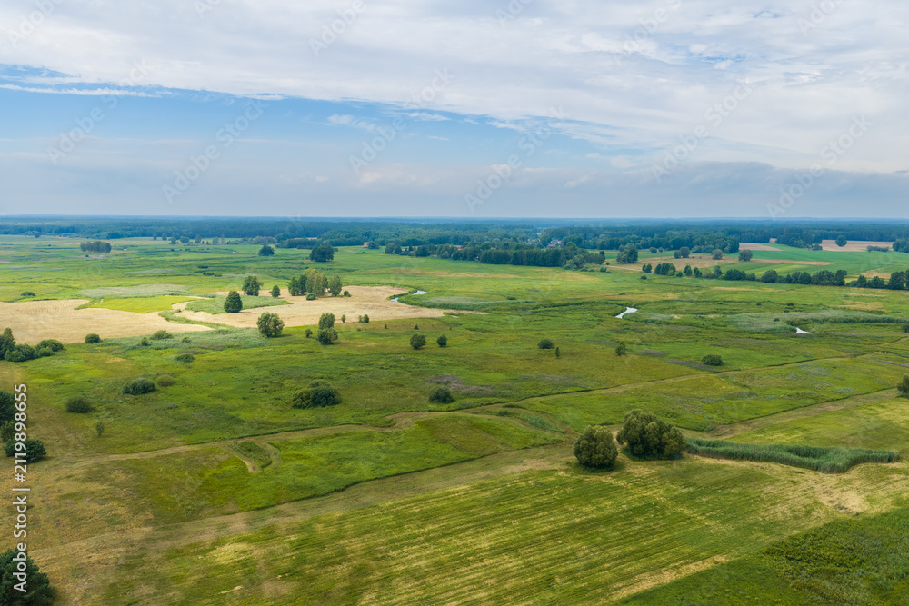 Fototapeta premium Narew River Valley landscape with winding river and expansive fields
