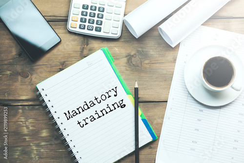 Photography Mandatory training text on torn white paper