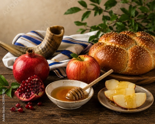Rosh Hashanah Jewish holiday traditional symbols with honey, apples, pomegranate and shofar on festive table