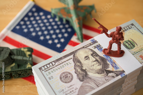 Quadro su tela US banknotes, army solider, combat aircraft fighter, tank on American flag