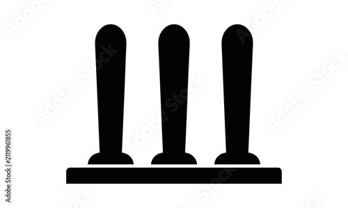 Abstract three vertical pillars on a horizontal base.