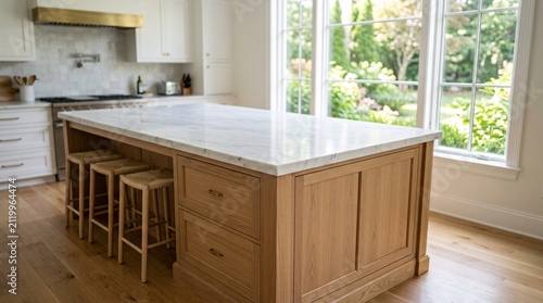 Canvas Print Modern kitchen island with marble countertop and bar stools.