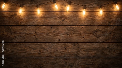 Rustic wooden wall background with warm glowing string lights