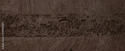 Brown colored abstract wall background texture with different shades of brown