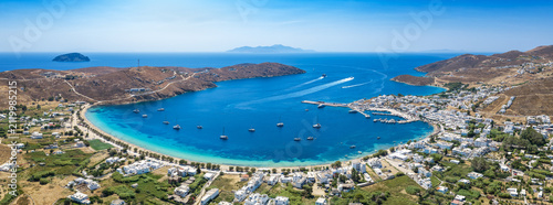 Panoramic aerial view of the bay of Livadi with beach, marina and port, Serifos island, Cyclades, Greece, during summer time