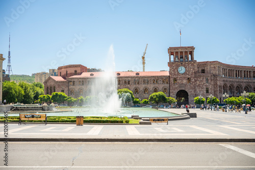 Fountain and Clock Tower at Republic Square under Blue Sky in Yerevan