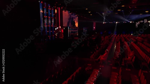 Aerial footage of a massive hall with empty seats before the show, 4k