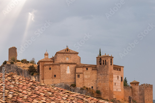 Skyward Citadel Rising Above Terracotta Roofs Under a Softened Mountain Sky