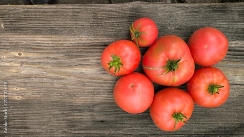 tomatoes on a wooden table