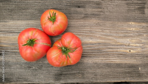 tomatoes on a wooden table