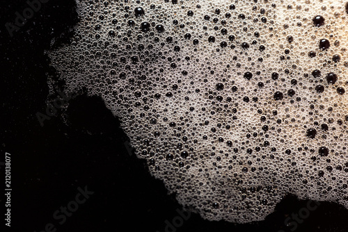 Konstfotografi Close-up shot of rich dark coffee crema with many small bubbles on top
