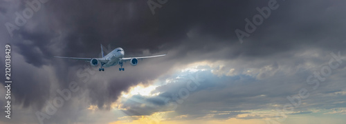 Passenger Plane Flying Through Dramatic Clouds