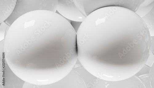 Close-up of smooth white glossy spheres clustered