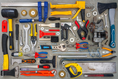 Konstfotografi Flat lay of old and new hand tools on concrete background