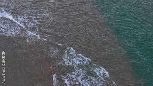 Aerial view of shallow beach shore.