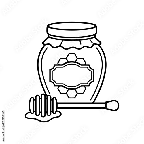 Honey jar with dipper stick.