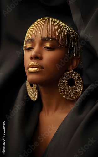Closeup Portrait of Woman with Golden Beaded Headpiece and Earrings
