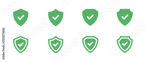 Set of green shield icons with checkmark symbol