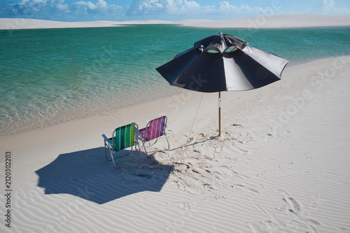 beach umbrella and chairs in Brazil's Lencois Maranhenses