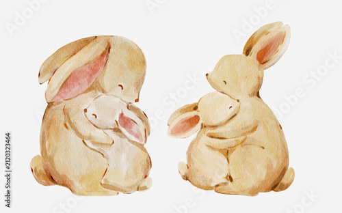 Watercolor bunny family illustration set with soft hand painted details. Cute woodland animals feel warm and heartwarming and perfect for nursery decor.