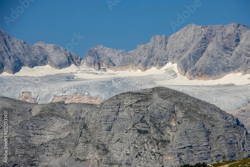 Obraz na plátně Melting glacier in the Austrian Alps during hot summer, climate change and rapid ice loss
