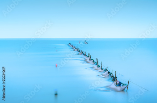 a view of the sea with a sea farm
