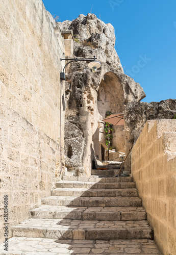 Characteristic stone alley in the Sassi of Matera, Basilicata, Italy.